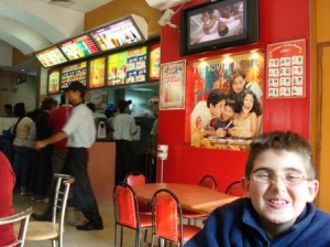 My son at a McDonald's in Delhi