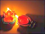 tn_ganesha-diya-hand-worship Diwali worship